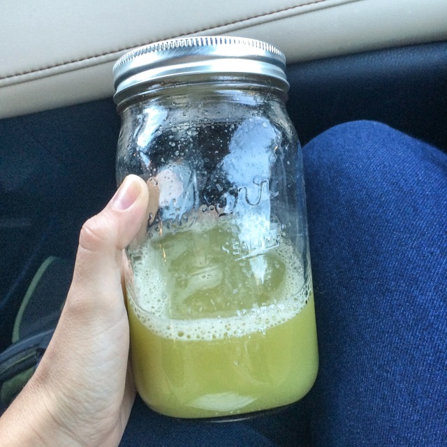 healthy green juice in a mason jar